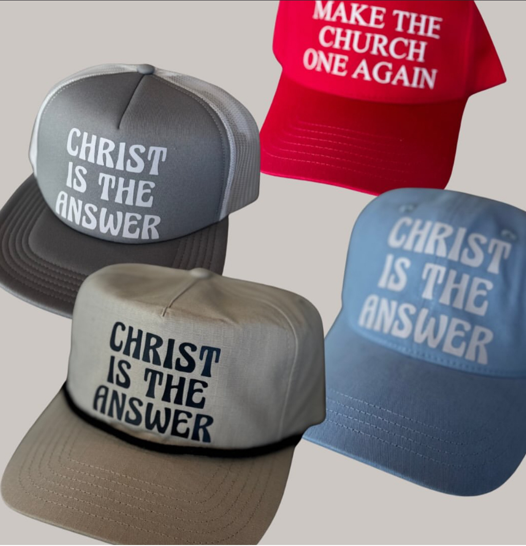 Four hats with 'Christ is the Answer' text on a gray background